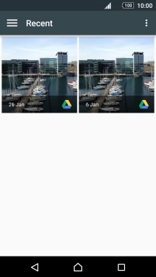 Slide your finger right starting from the left side of the screen.