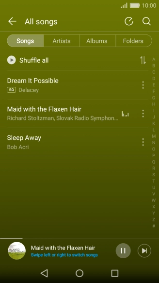 Press the song title at the bottom of the screen.