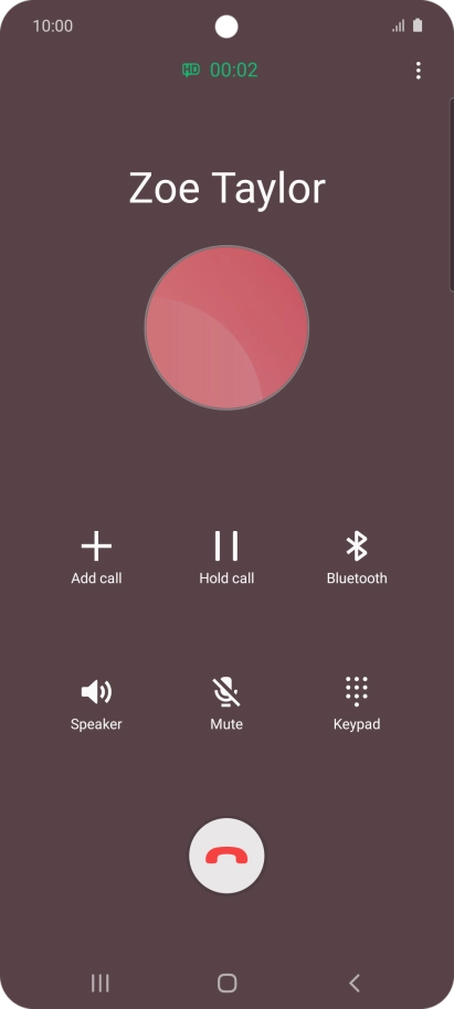 Press the end call icon.
