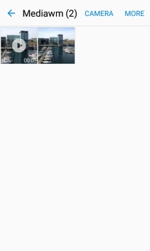 Go to the required folder and press the required picture or video clip.