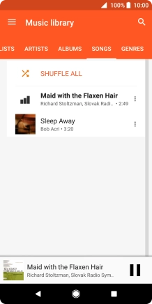Press the song title at the bottom of the screen.