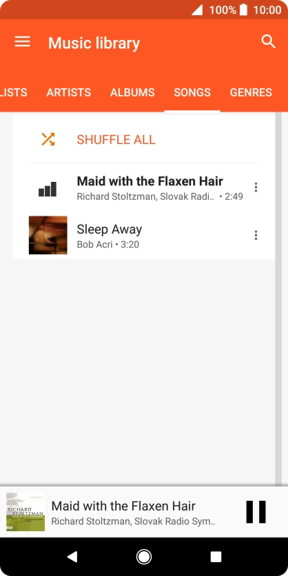 Press the song title at the bottom of the screen.