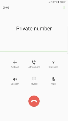 Press the end call icon.