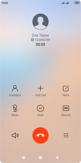 Press the end call icon.