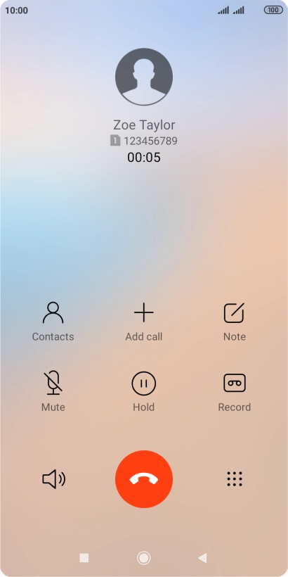 Press the end call icon.