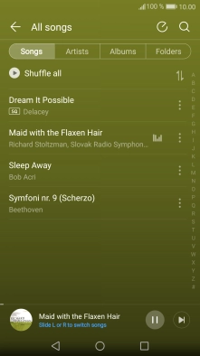 Press the song title at the bottom of the screen.