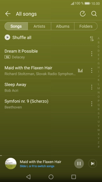 Press the song title at the bottom of the screen.