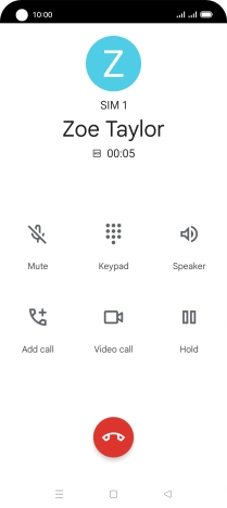 Press the end call icon.