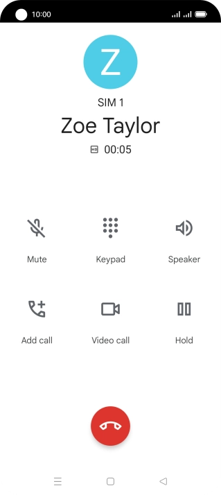Press the end call icon.