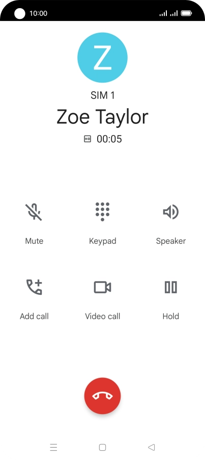 Press the end call icon.