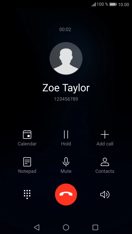 Press the end call icon.