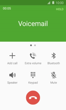 Press the end call icon.