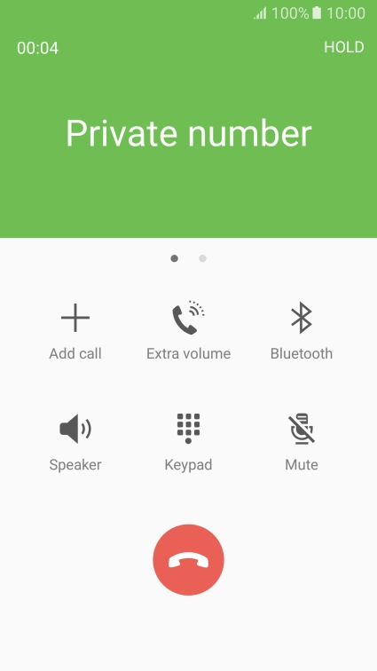 Press the end call icon.