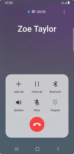 Press the end call icon.