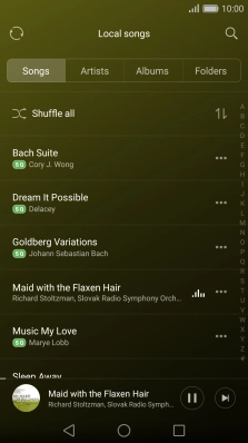 Press the album cover at the bottom of the screen.