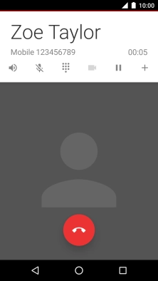 Press the end call icon.