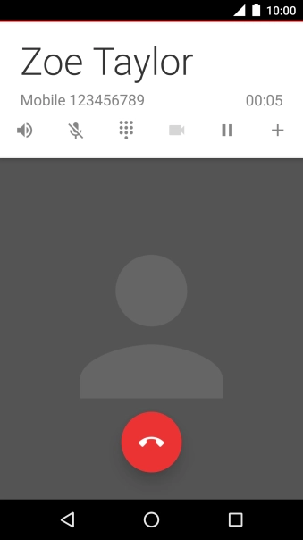 Press the end call icon.