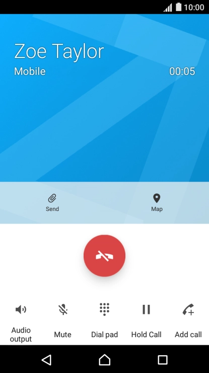Press the end call icon.