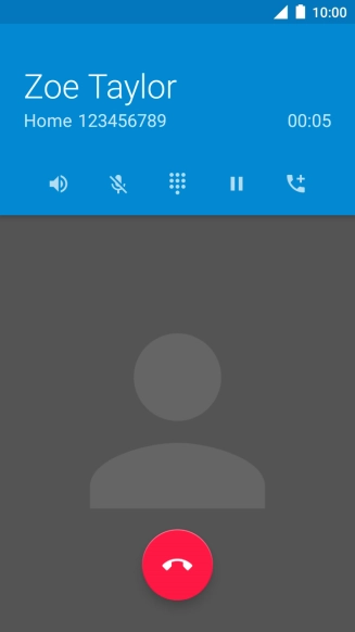 Press the end call icon.