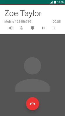 Press the end call icon.