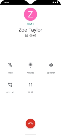 Press the end call icon.