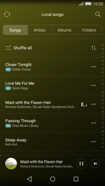 Press the album cover at the bottom of the screen.