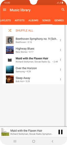 Press the song title at the bottom of the screen.