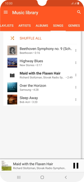 Press the song title at the bottom of the screen.