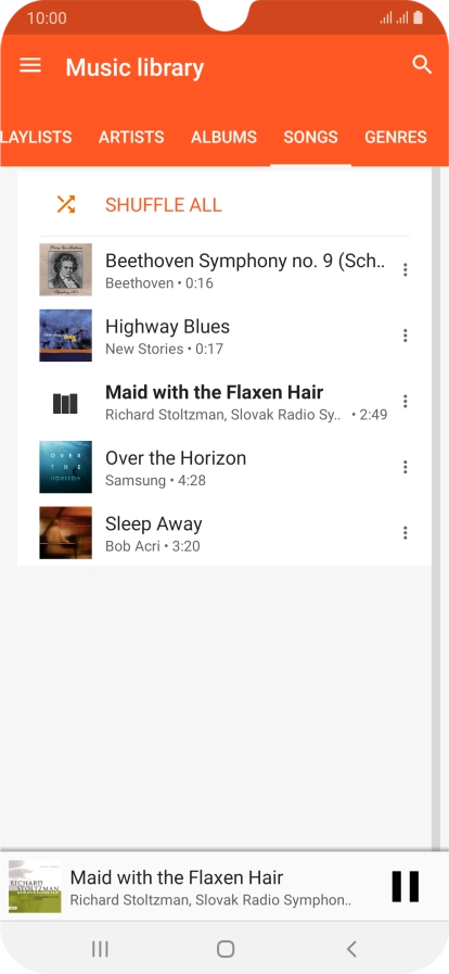 Press the song title at the bottom of the screen.
