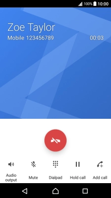 Press the end call icon.