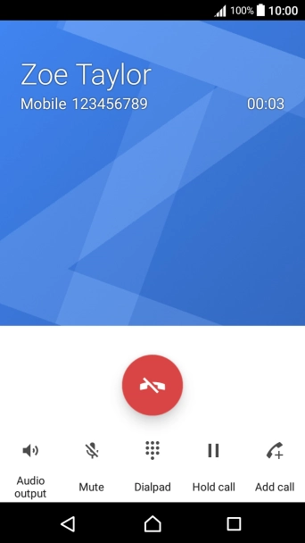 Press the end call icon.