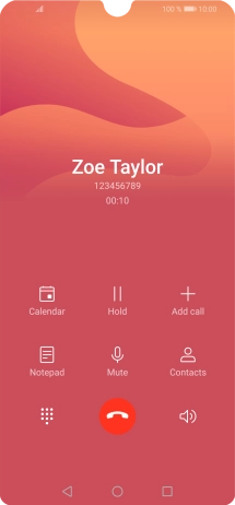 Press the end call icon.