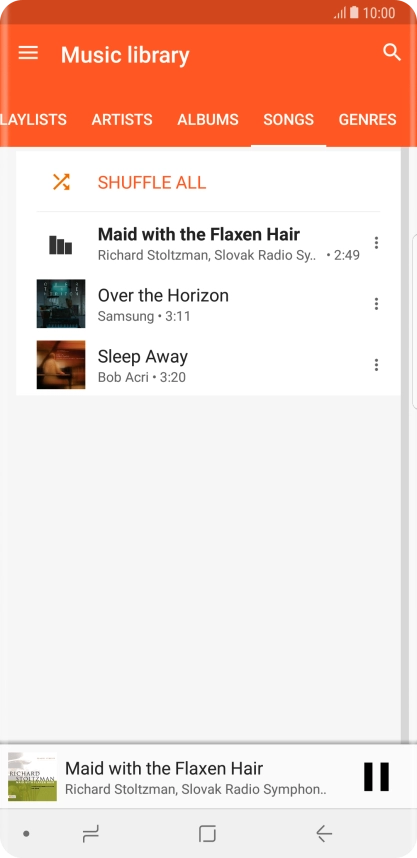 Press the song title at the bottom of the screen.