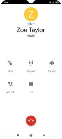 Press the end call icon.