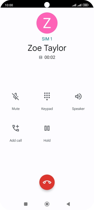 Press the end call icon.