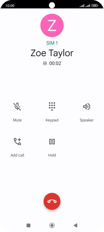 Press the end call icon.