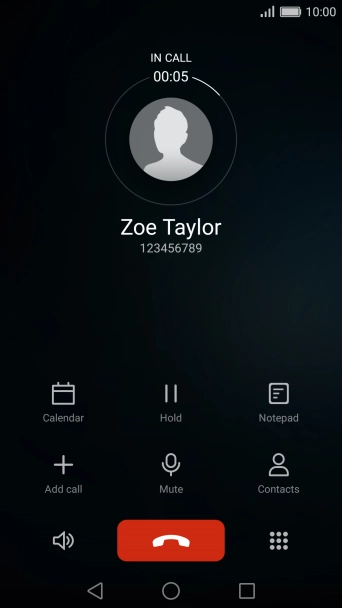 Press the end call icon.