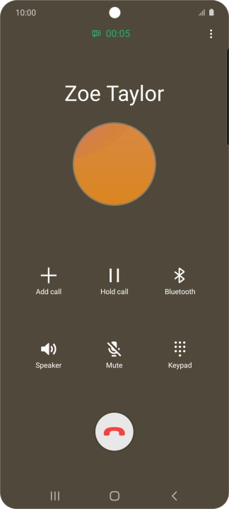 Press the end call icon.
