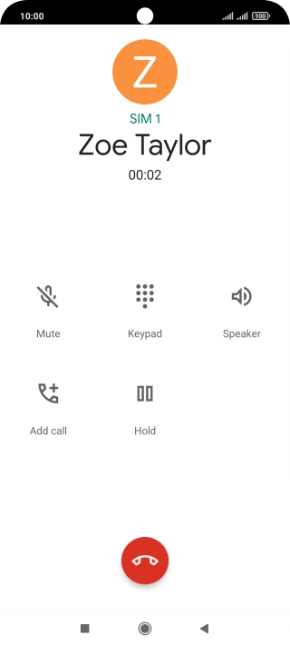 Press the end call icon.