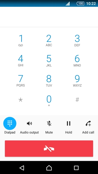 Press the end call icon.