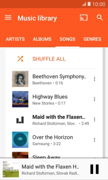 Press the song title at the bottom of the screen.
