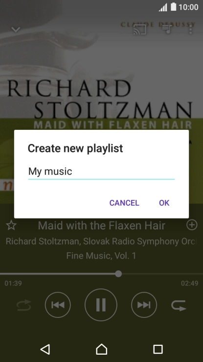 Key in a name for the playlist and press OK.