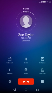 Press the end call icon.