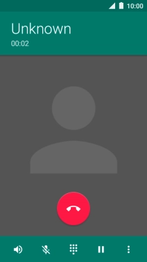 Press the end call icon.