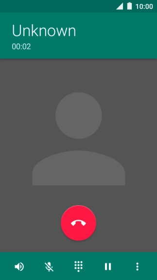 Press the end call icon.