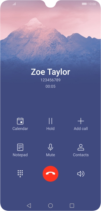 Press the end call icon.