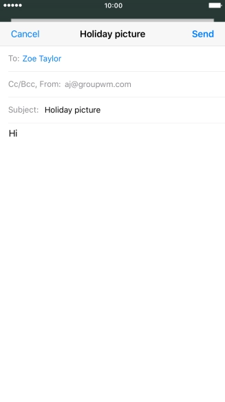 Press and hold the text input field until a pop-up menu is displayed.