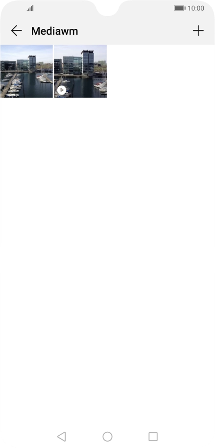 Press and hold any picture or video clip.