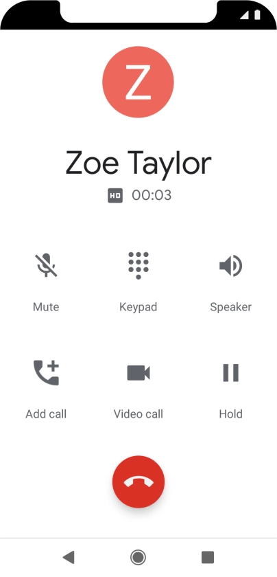 Press the end call icon.