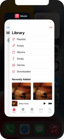 Slide upwards on the required application to end it.